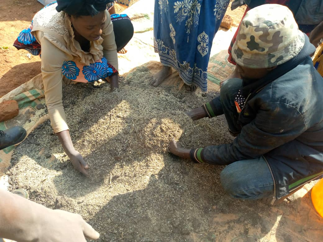 Compost making demonstrations with farmers and Tiyeni's Training Manager in Zomba